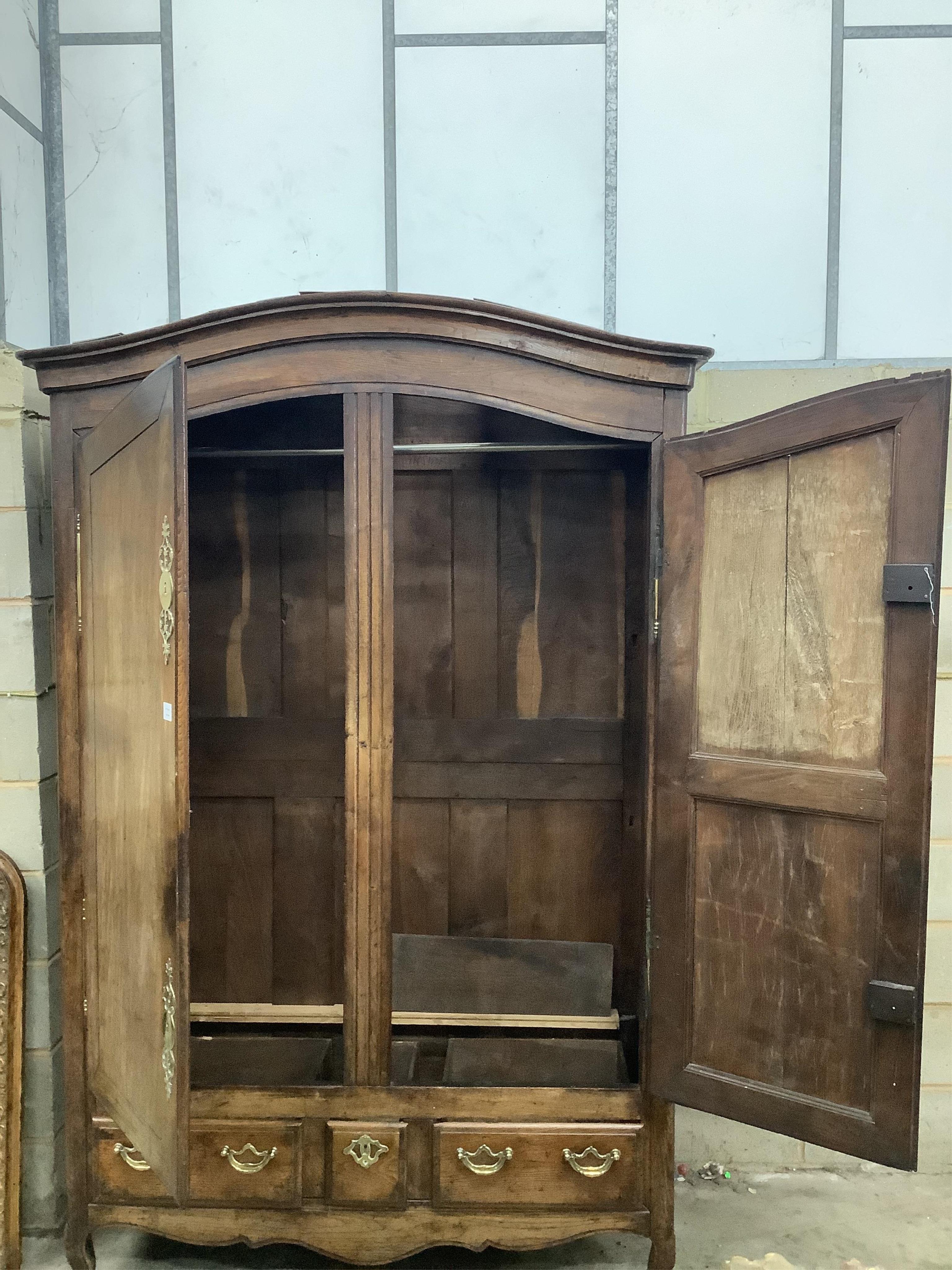 A late 18th century French provincial walnut armoire, width 150cm, depth 64cm, height 231cm. Condition - fair